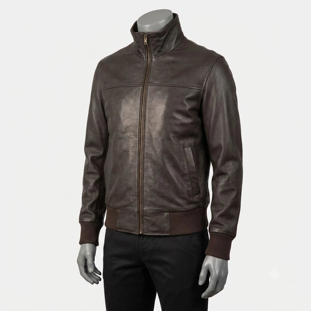 A dark brown leather jacket with a stand-up collar and front zipper, displayed on a gray mannequin torso against a light gray background.