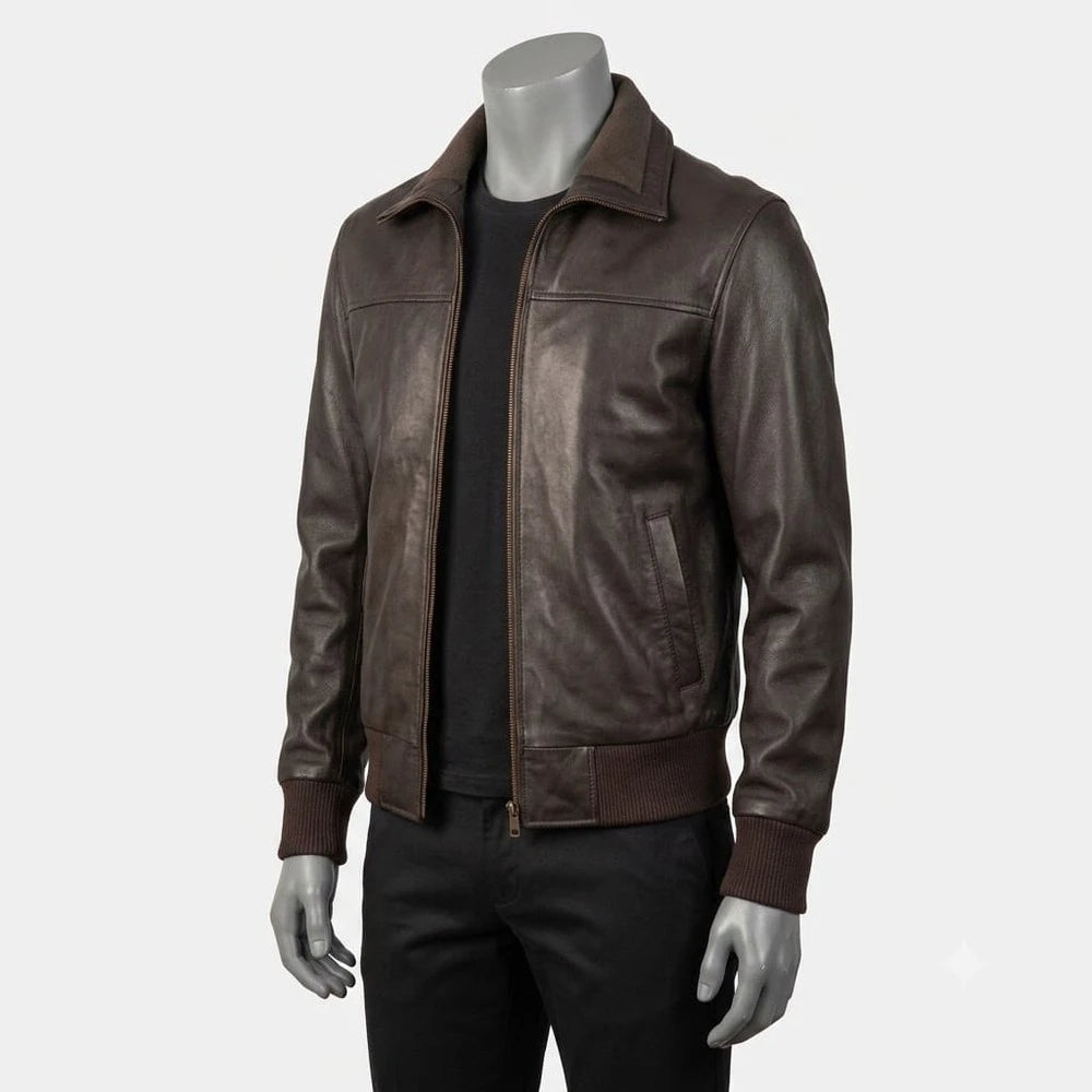 A dark brown leather jacket displayed on a gray mannequin torso, worn over a black shirt and black pants against a light gray studio background.